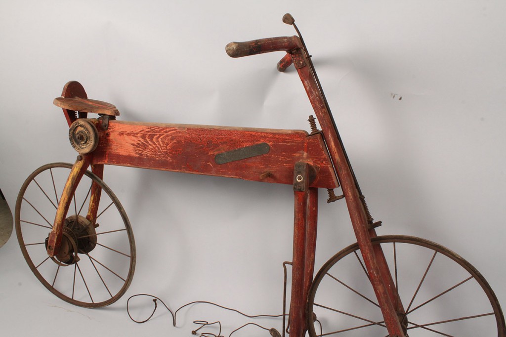 Lot 677: Early Mergomobile Wooden Bicycle