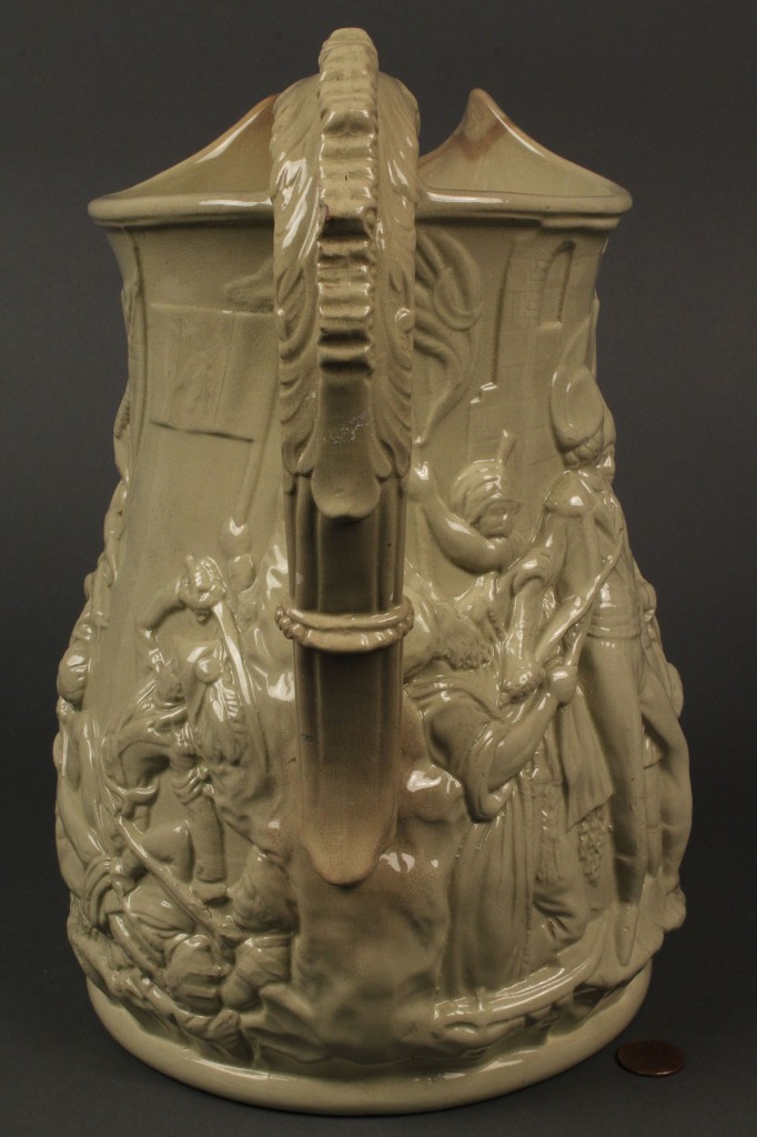 Lot 702: Lot of 2 Pitchers incl. a patriotic scene in relief