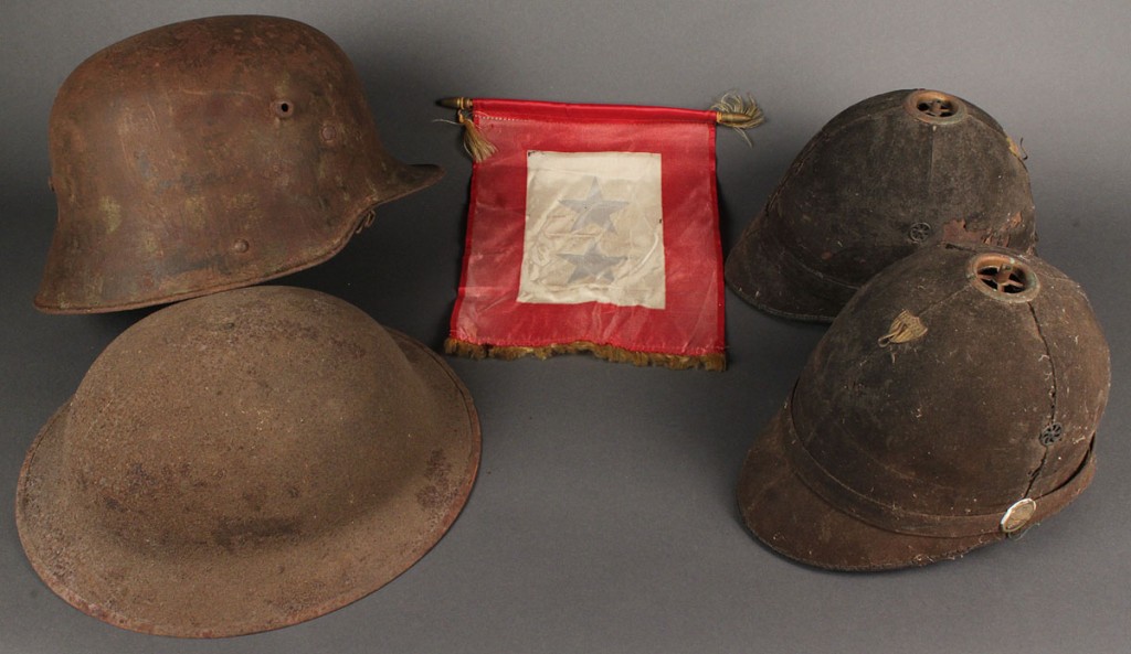 Lot 710: Lot of 2 World War I helmets &  2 19th Century Army Spike Helmets, 4 items