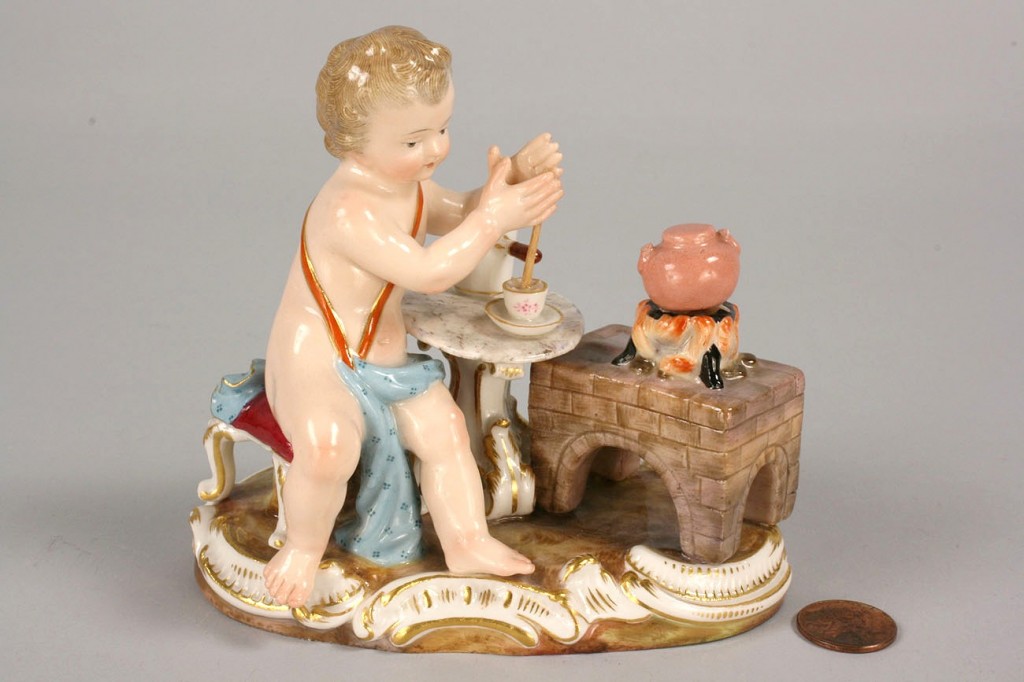 Lot 118: Meissen Figurine of cherub making tea