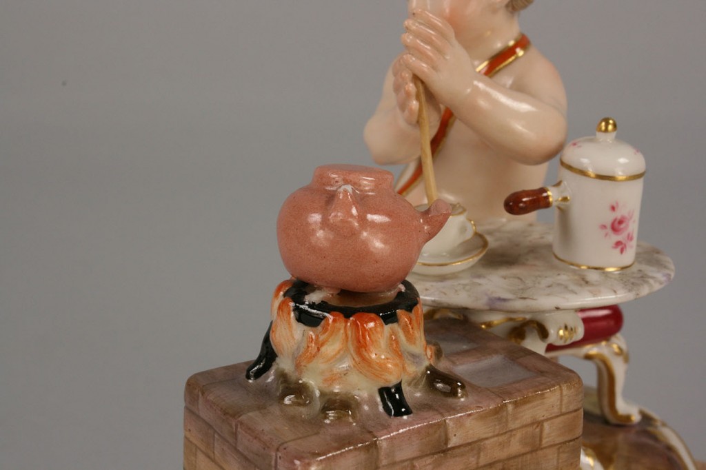 Lot 118: Meissen Figurine of cherub making tea