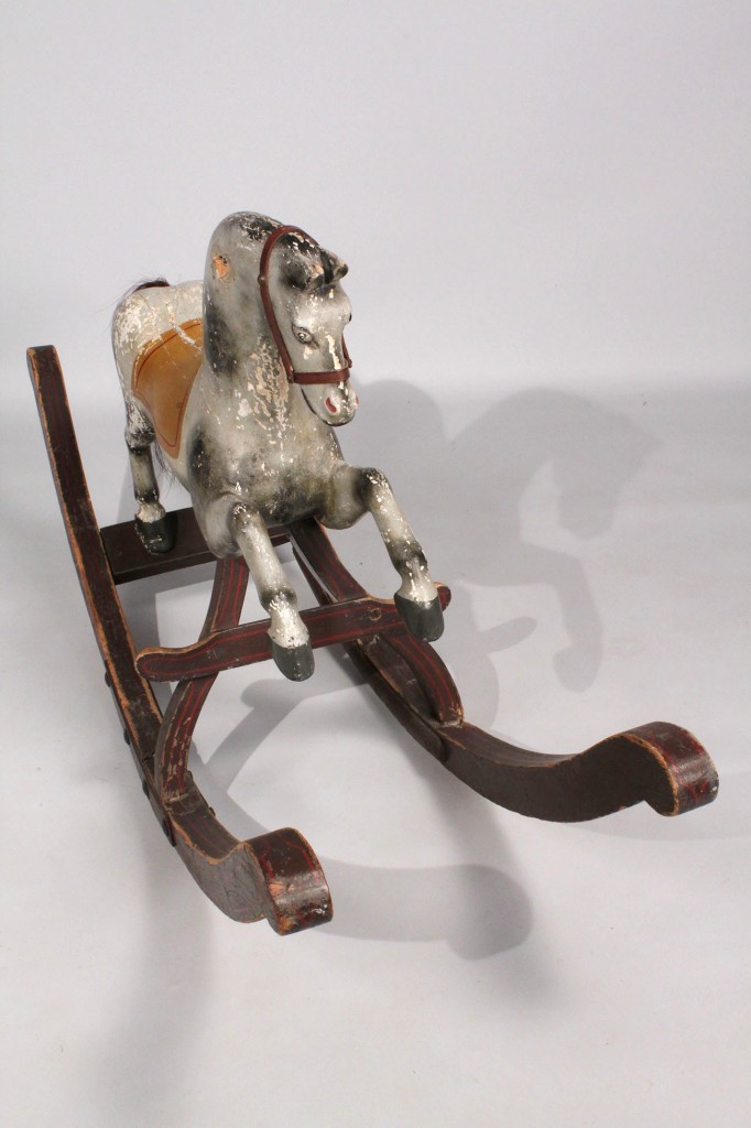 Lot 196: Carved and painted rocking horse