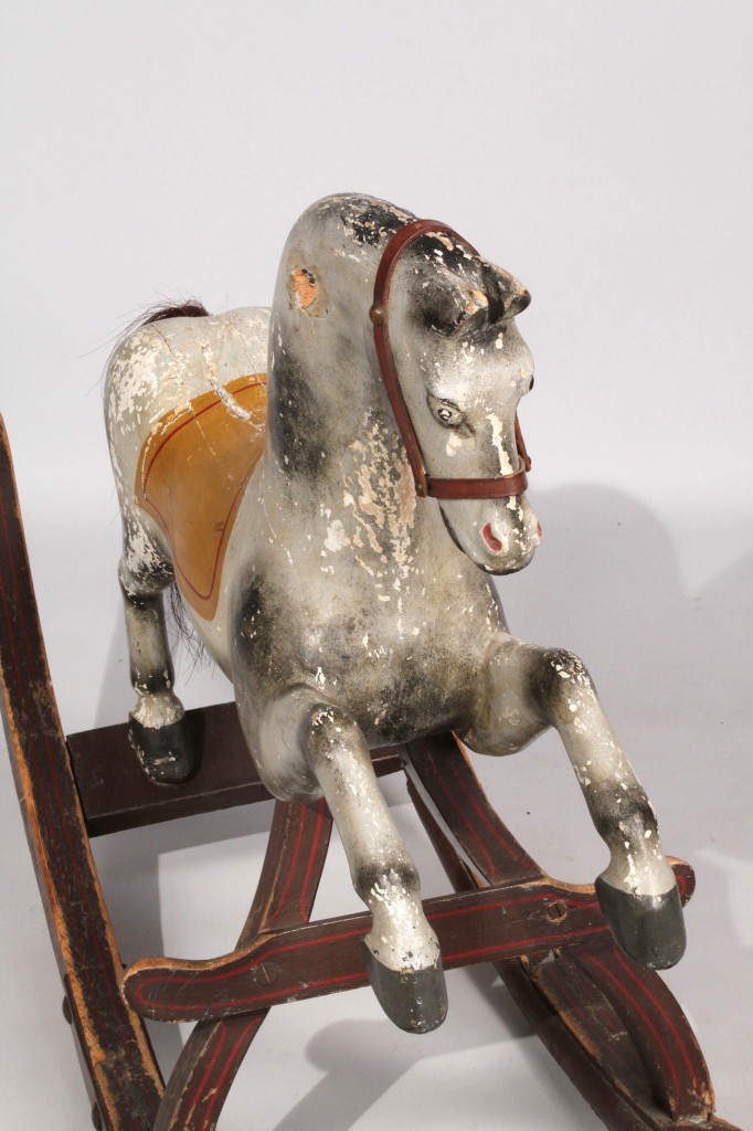 Lot 196: Carved and painted rocking horse