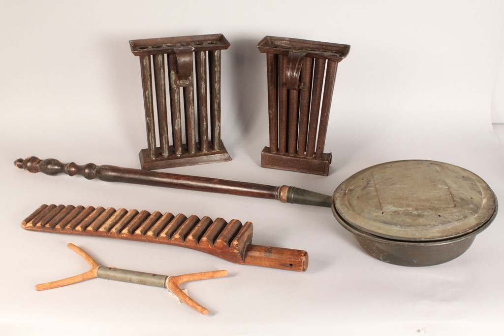Lot 223: Tin candle molds, bedwarmer & other primitives, lo