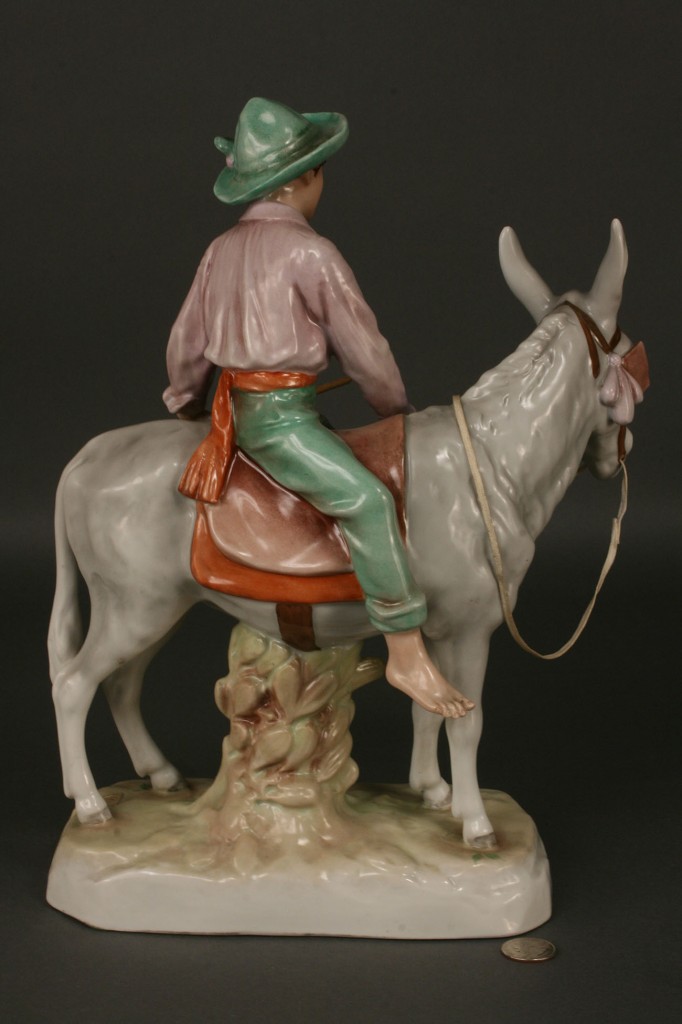Lot 252: Royal Dux Figure of Boy on Donkey