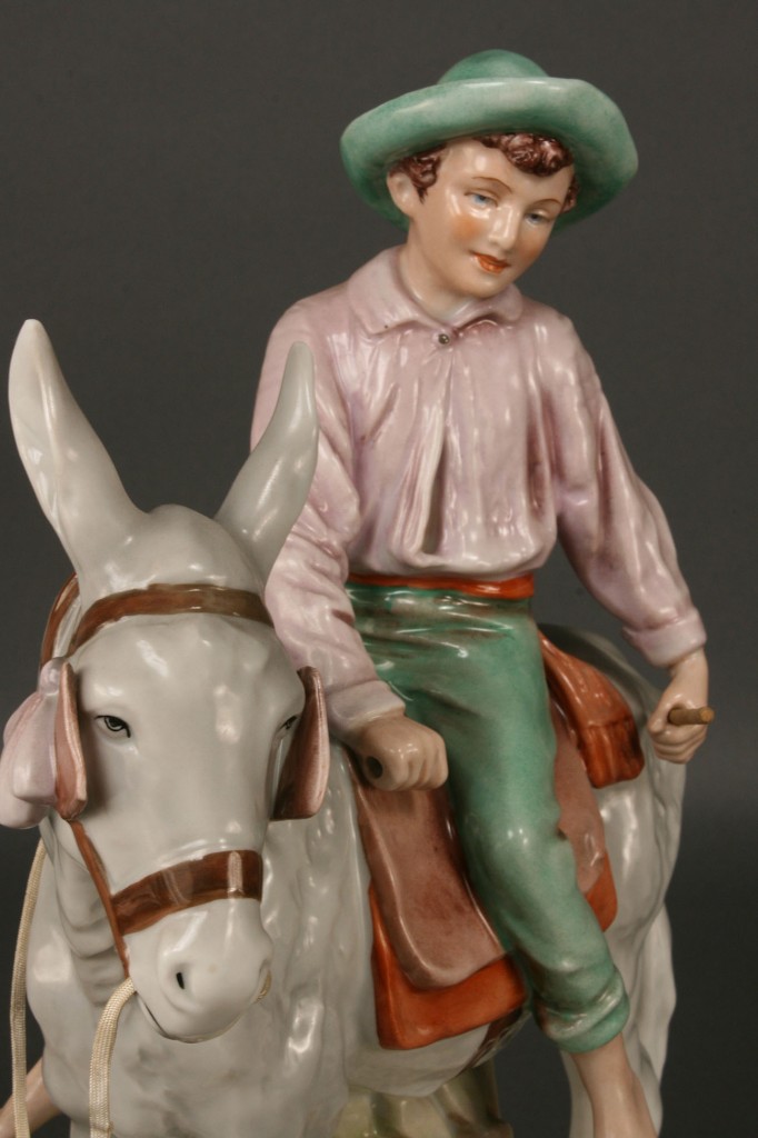 Lot 252: Royal Dux Figure of Boy on Donkey