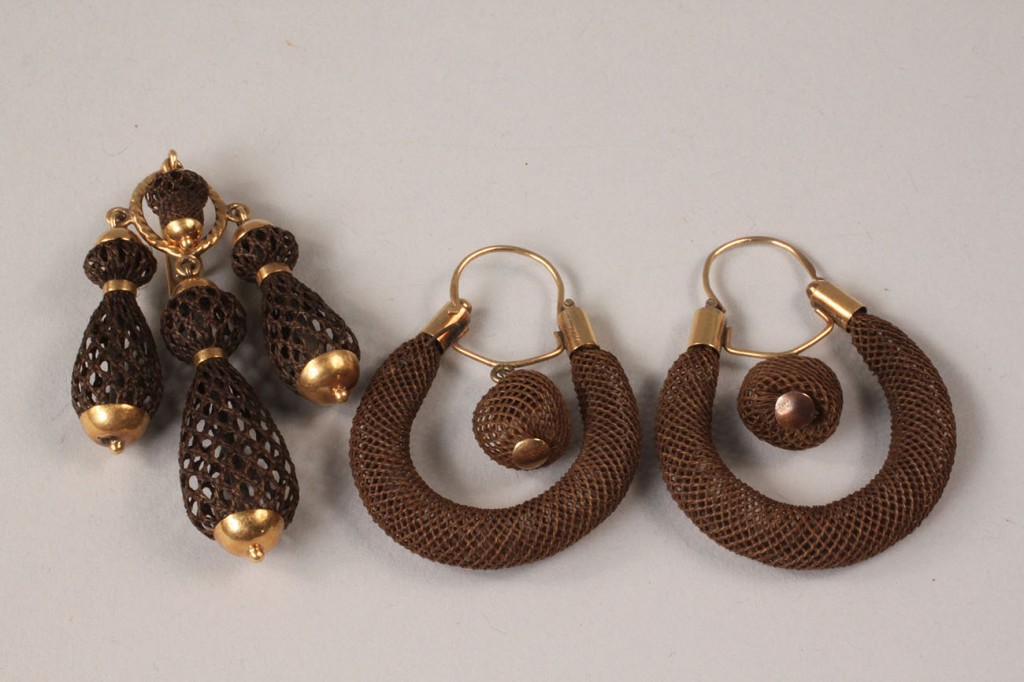 Lot 317: Victorian hair open work earrings and brooch