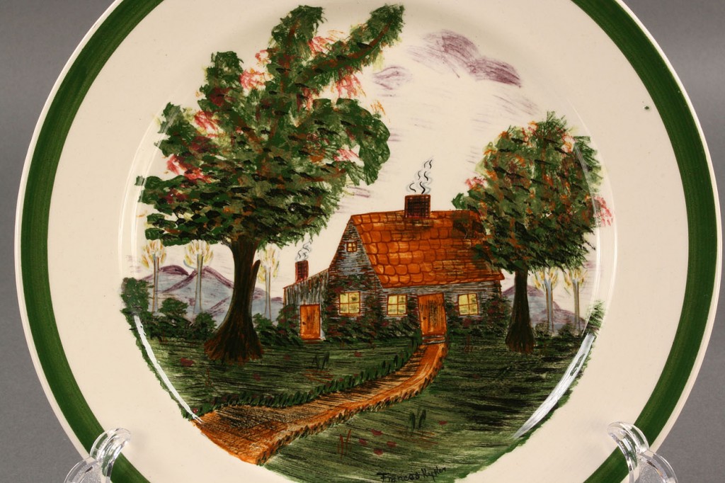 Lot 402: Blue Ridge Porcelain Cabin scene plate, sgd Kyker