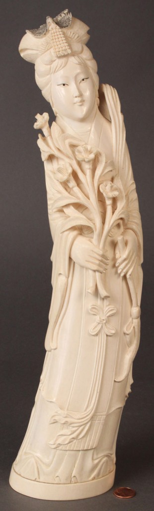 Lot 429: Carved Ivory Figure from an elephant tusk