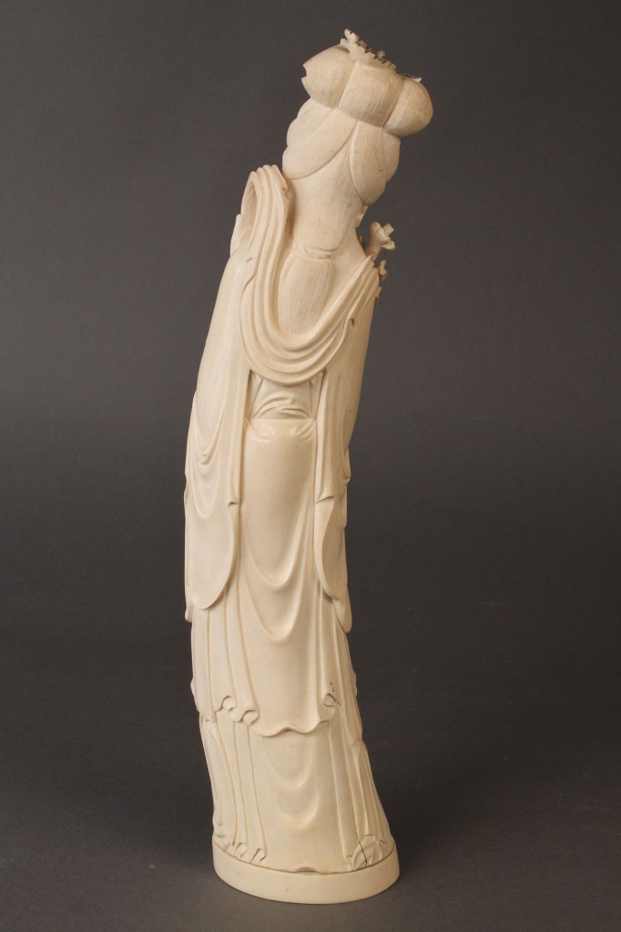 Lot 429: Carved Ivory Figure from an elephant tusk