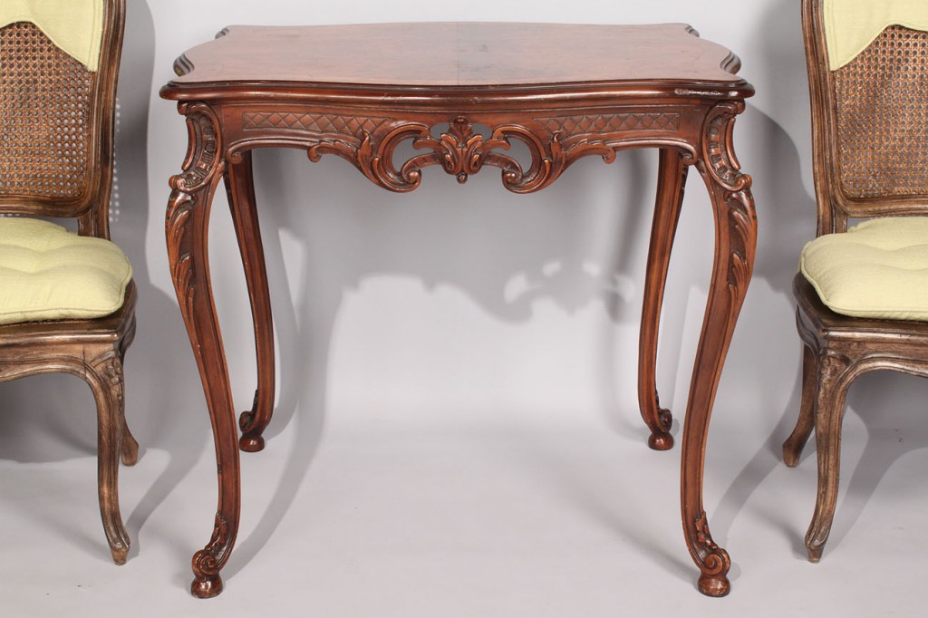 Lot 479: Louis XV table and pair of chairs
