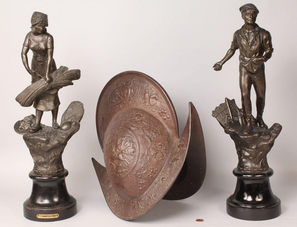 Lot 569: 19th c. repro. Morian Helmet & Pr. metal figures