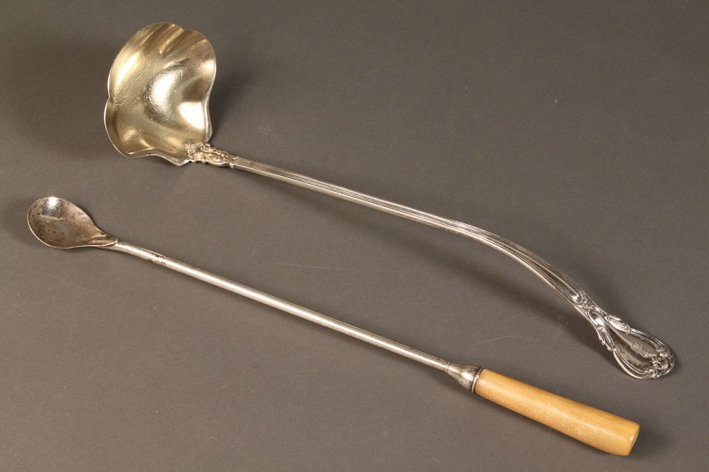Lot 612: Silver and bone claret spoon and sterling ladle
