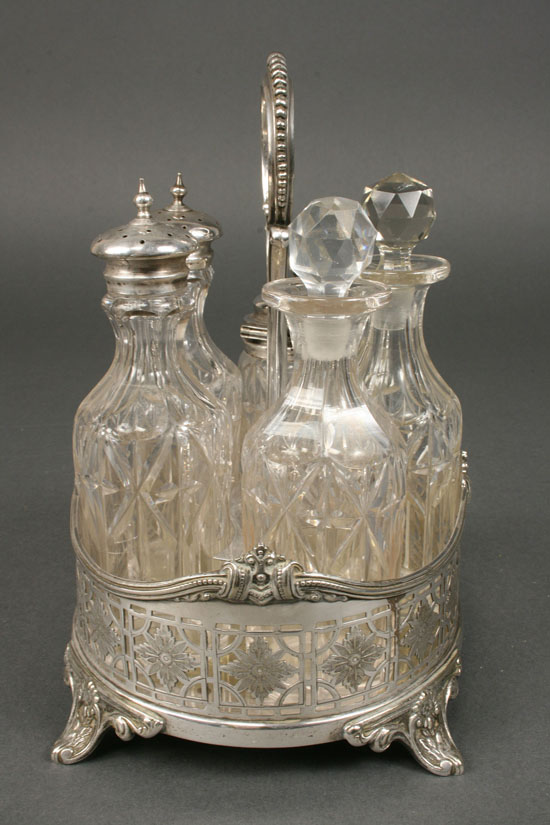 Lot 624: Silver and Glass Condiment Servers