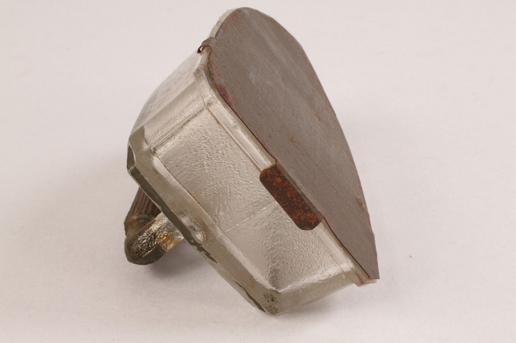 Lot 646: Flat Iron Candy Container