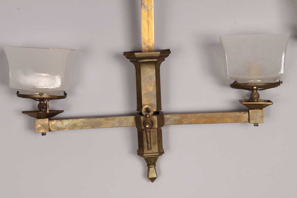 Lot 688: Two brass gasoliers with square glass shades