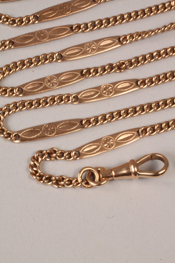 Lot 98: 14K Gold Watch Chain, engraved links