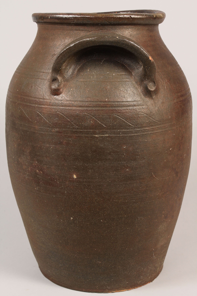 Lot 108: TN Mort Pottery Jar with Sine Wave Incising