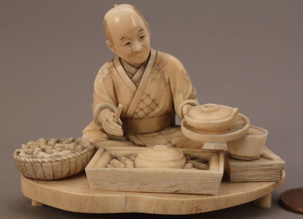 Lot 14: Ivory Okimono figure, man cooking