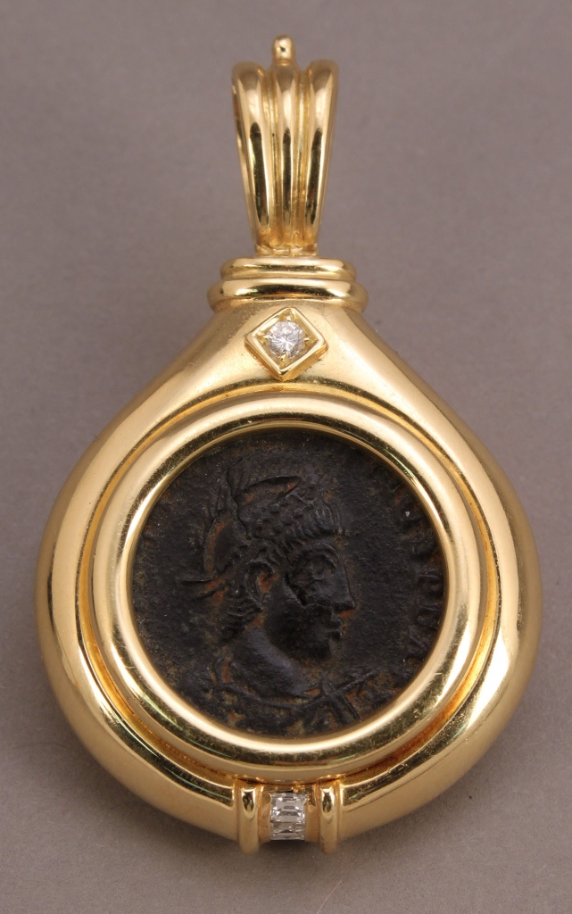 Lot 157: Roman Coin in 18K pendant with diamonds