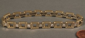 Lot 167: 14K Diamond Link Bracelet, 8" L