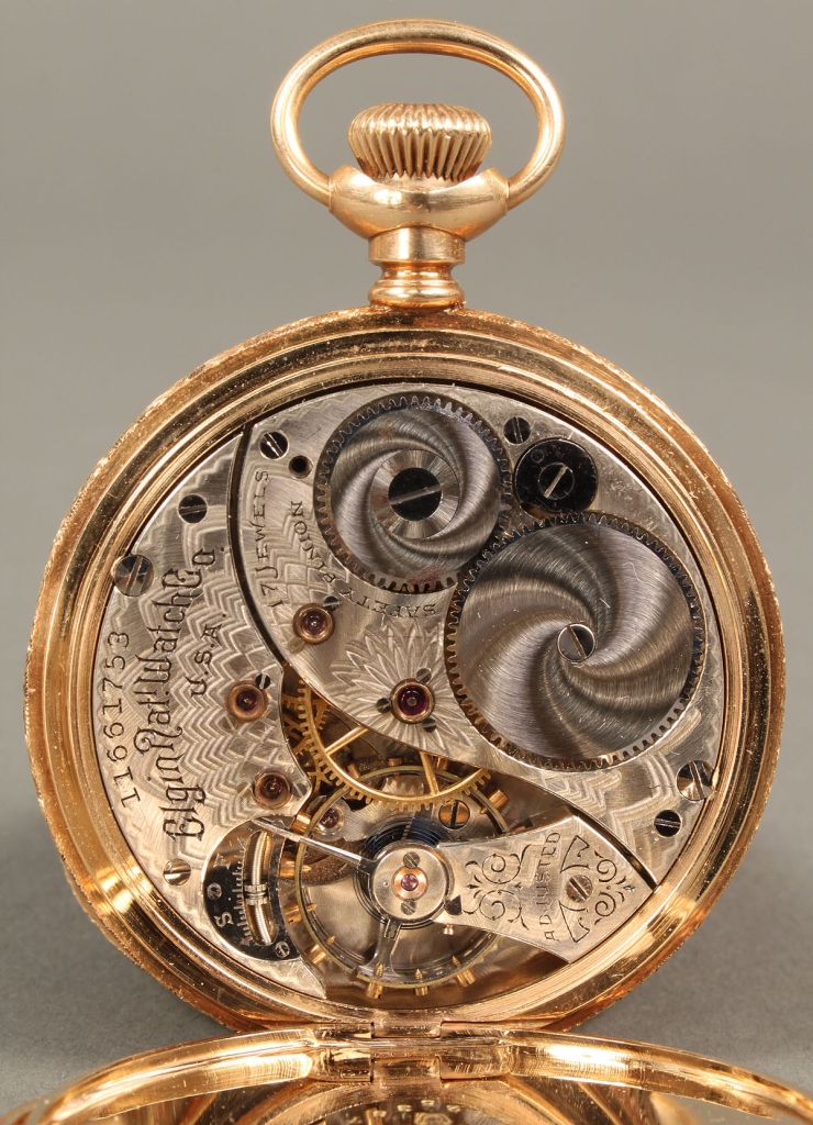 Lot 178: 14K gold Elgin pocket watch with c-scroll filligre