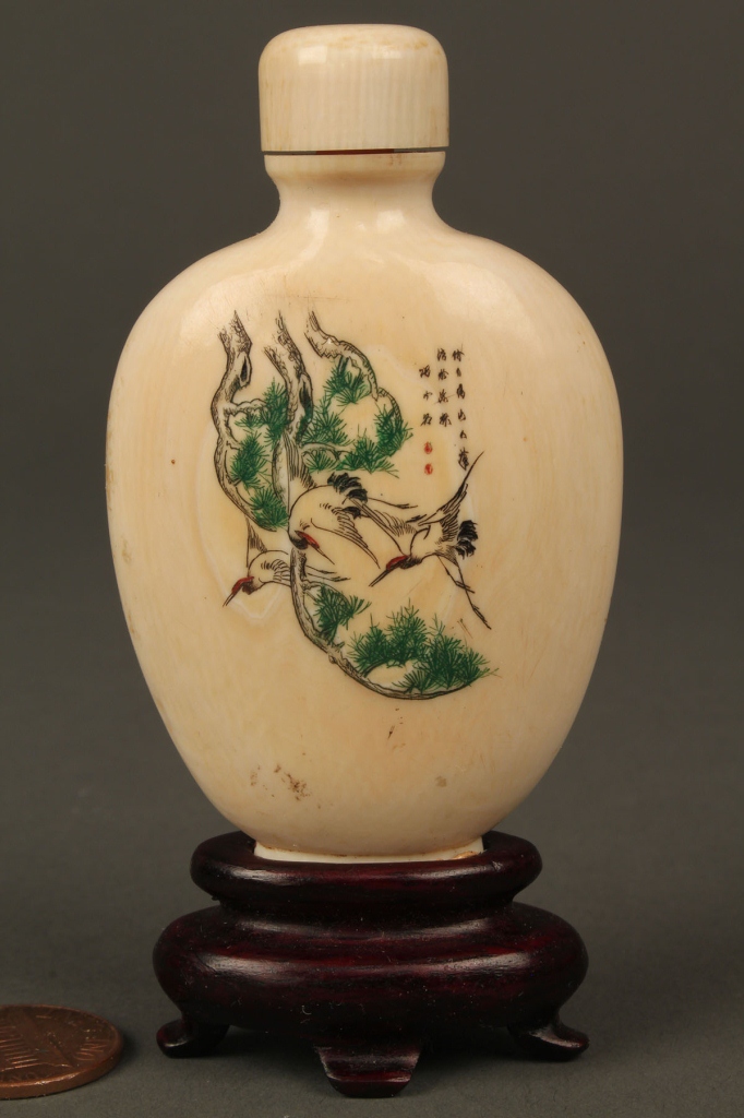Lot 17: Carved and painted ivory snuff bottle