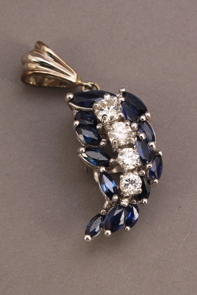 Lot 183: 14K sapphire and diamond crescent pendant