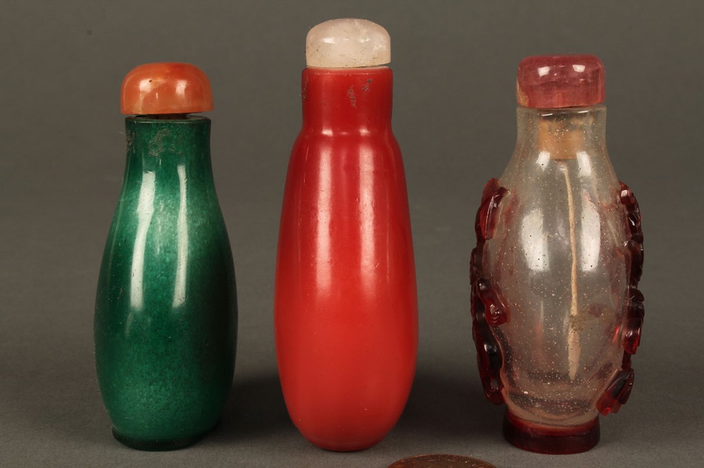 Lot 234: Three Peking glass snuff bottles