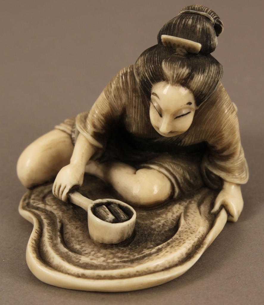 Lot 238: Ivory okimono style figural netsuke, signed