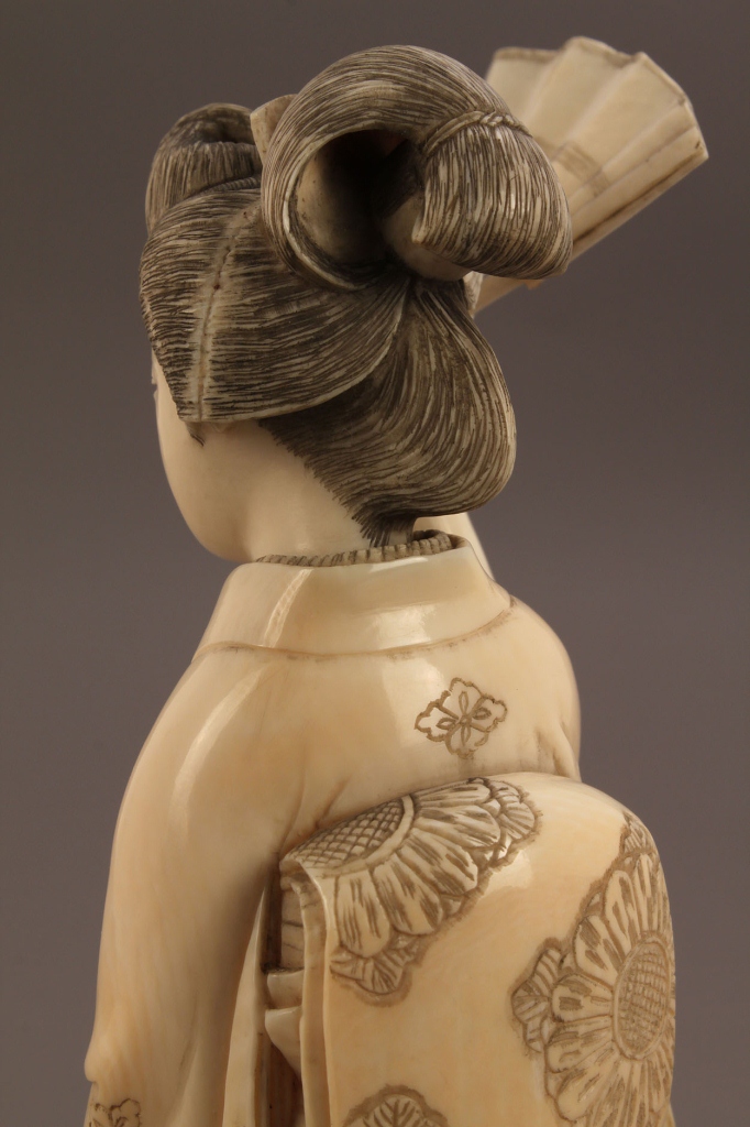 Lot 248: Ivory Okimono figure of a Geisha