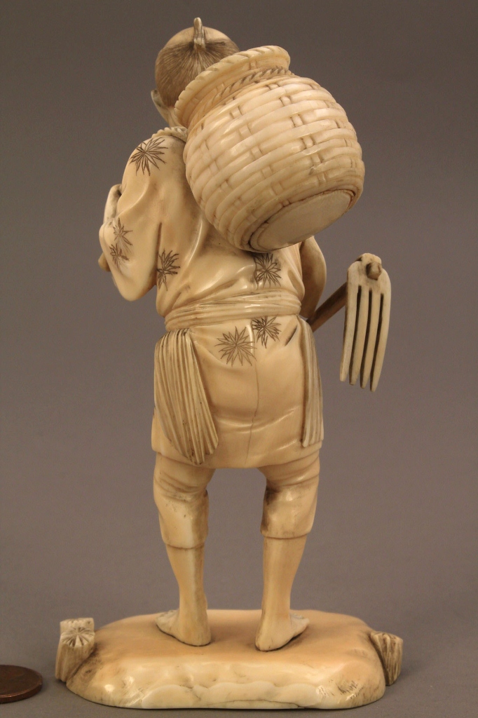 Lot 250: Asian Ivory Okimono figure, farmer with basket
