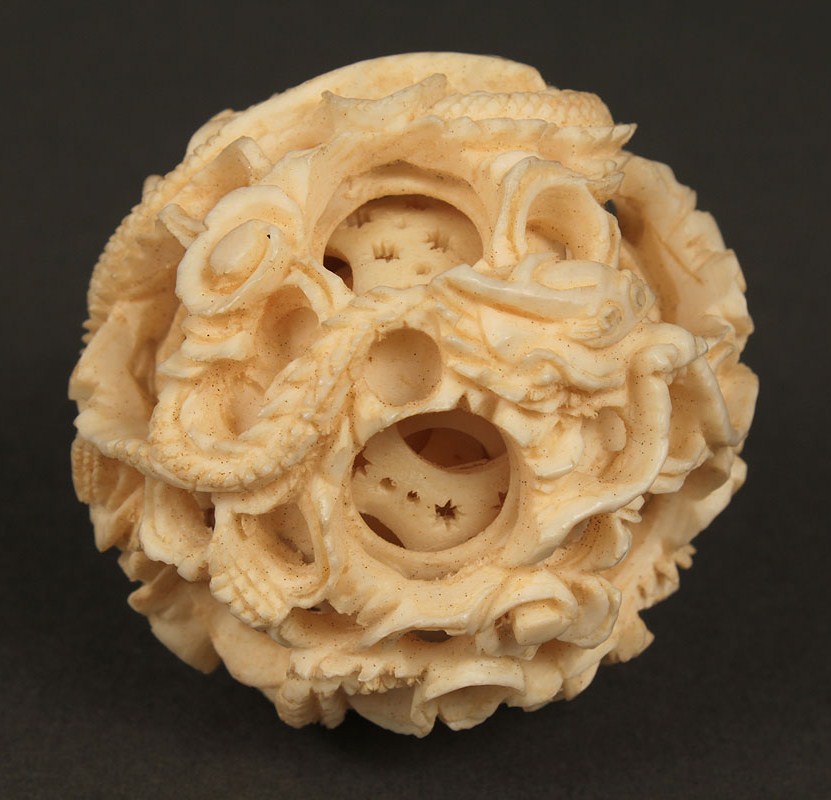 Lot 252: Asian Ivory puzzle ball & figures, 5 items