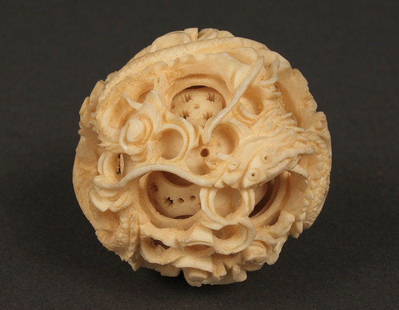Lot 252: Asian Ivory puzzle ball & figures, 5 items