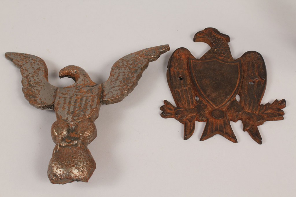 Lot 267: Six patriotic items: iron eagles, pins, bank, and