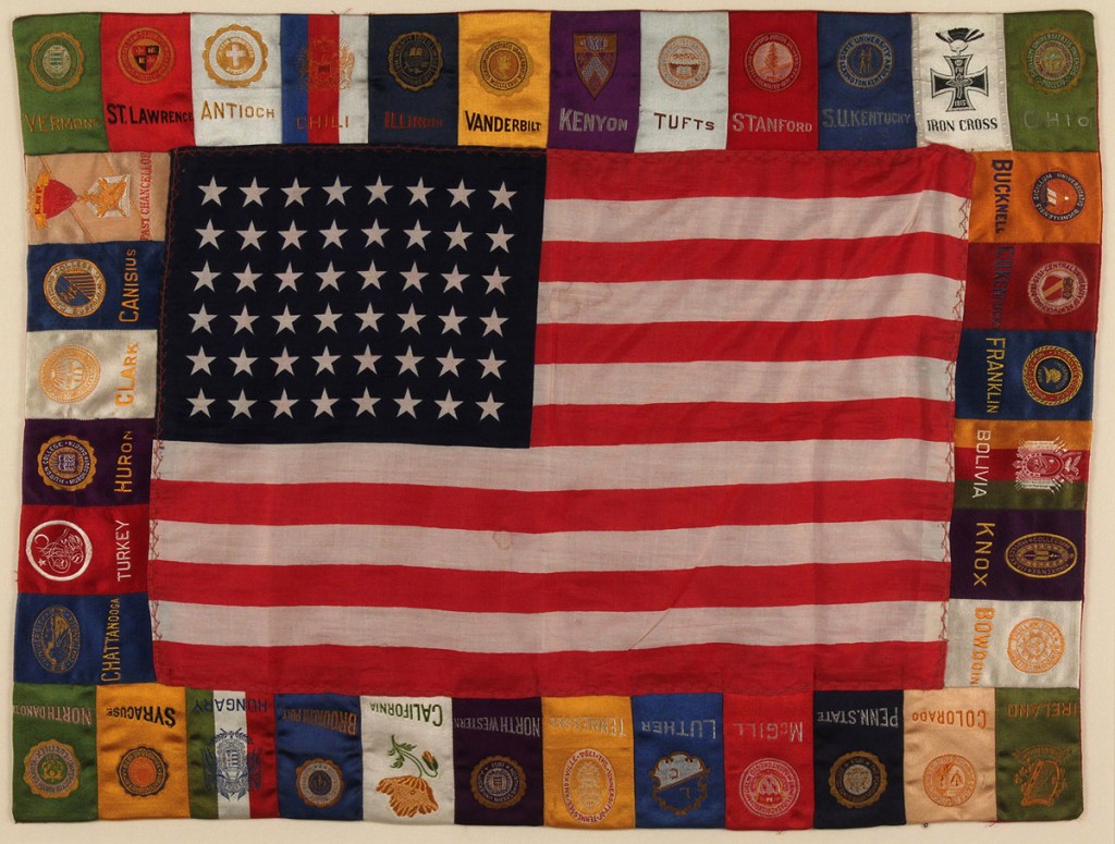 Lot 271: Framed 48 star flag with college pennants