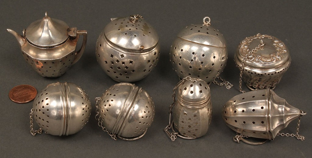 Lot 379: Lot of Silver Tea Infusers, 5 sterling, various sh