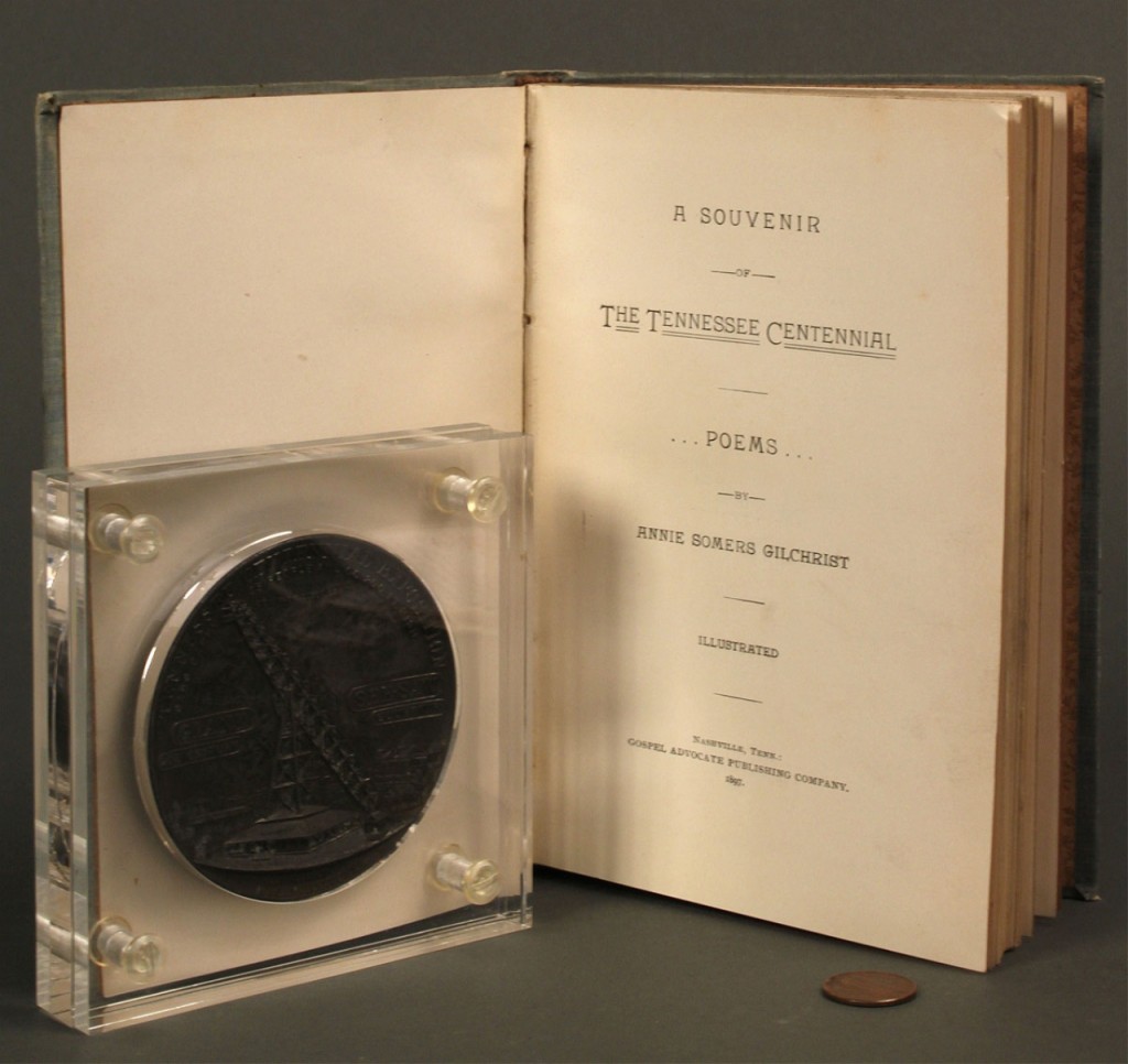 Lot 453: 2 TN Centennial Items: book and See Saw medal