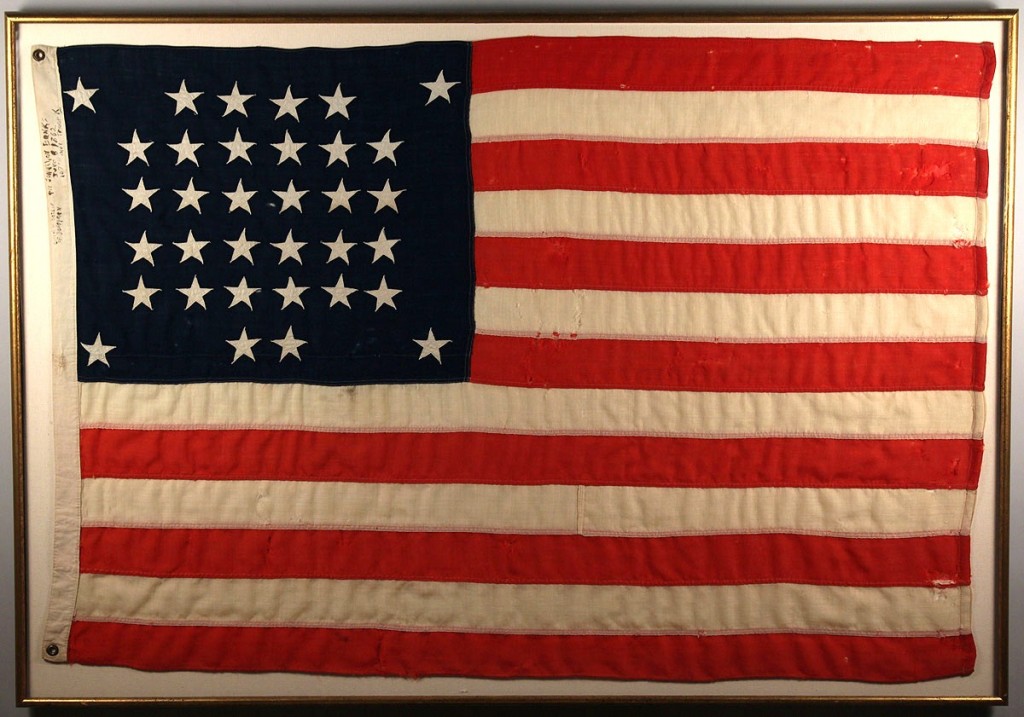 Lot 481: 34 star wool flag with inscription, post Civil War