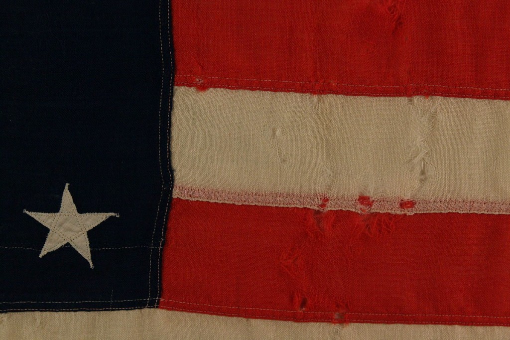 Lot 481: 34 star wool flag with inscription, post Civil War