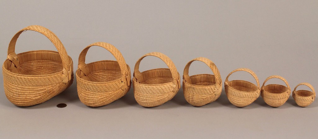 Lot 50: Set of 7 Miniature Graduated Baskets, Trevle Wood