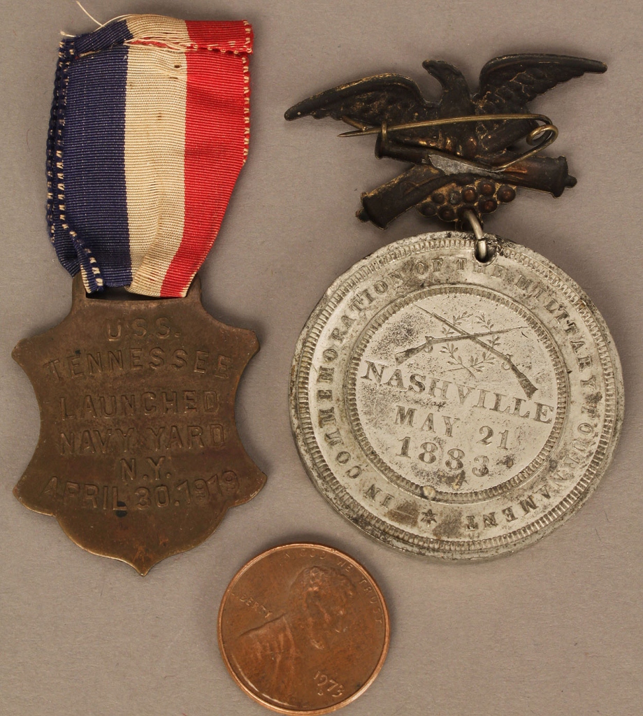 Lot 512: USS Tennessee and Nashville Tournament medals (2 i