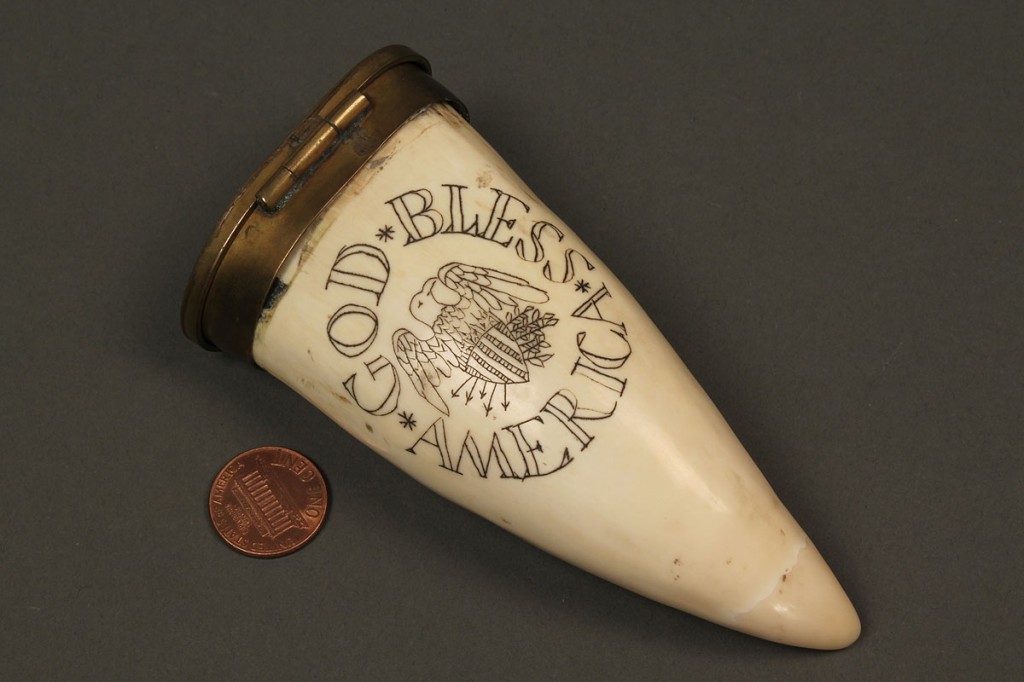 Lot 526: 8 powder flasks and 1 scrimshaw engraved tooth