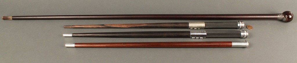 Lot 527: Collection of 4 walking & military swagger sticks