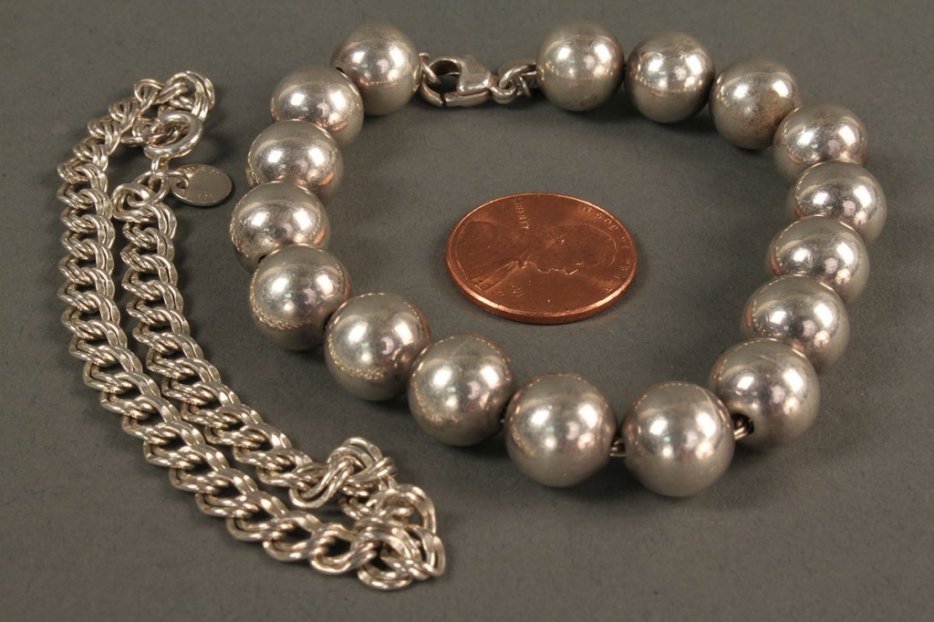 Lot 557: 2 Tiffany Sterling Bracelets, Bead & Link