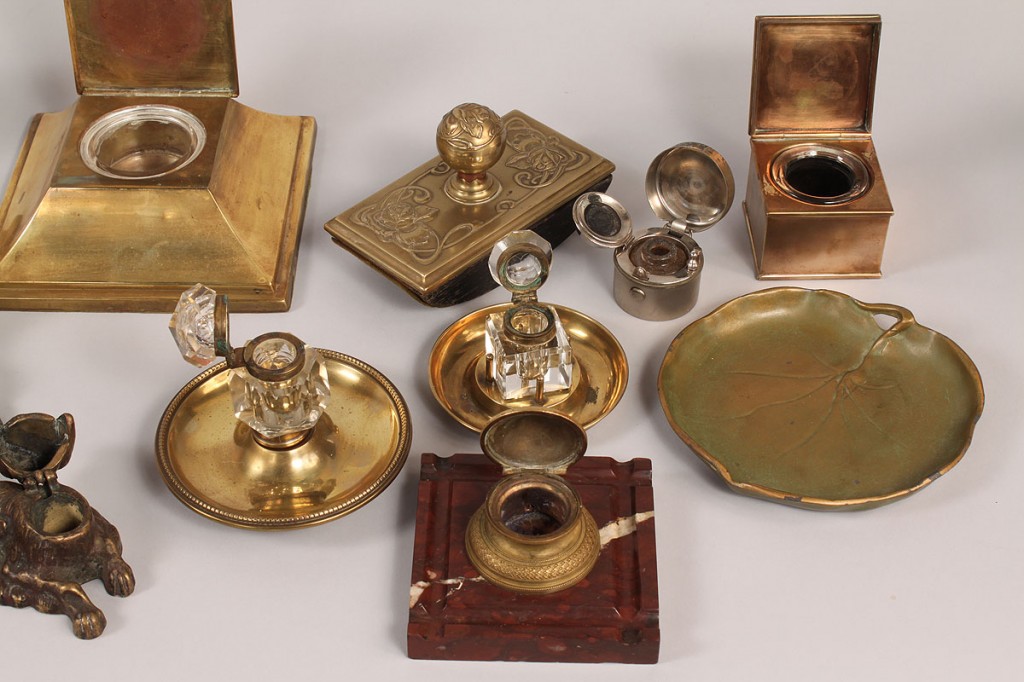 Lot 596: Assembled Brass desk and inkwell items, 17 items