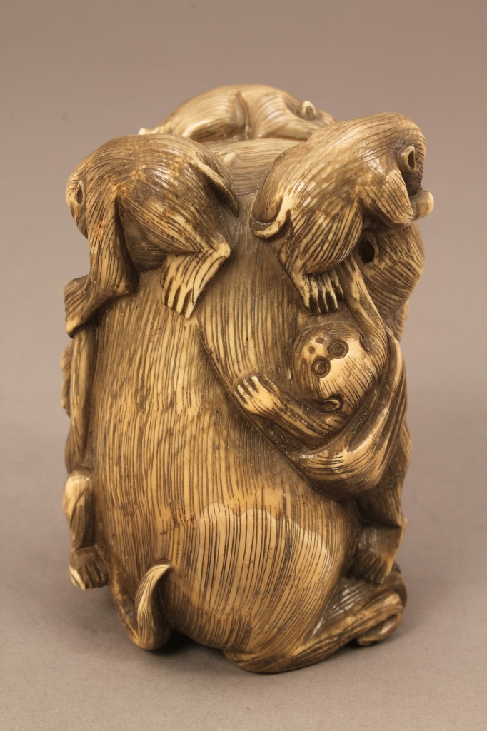 Lot 609: Large carved bone or ivory monkey netsuke