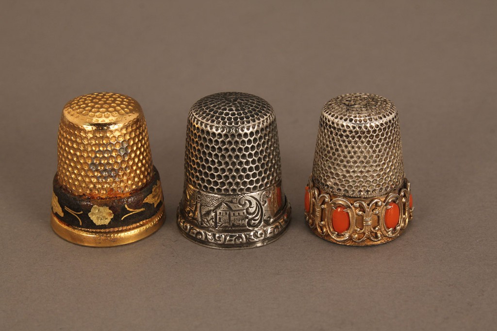 Lot 672: 17 Assorted Thimbles, incl. 9 sterling