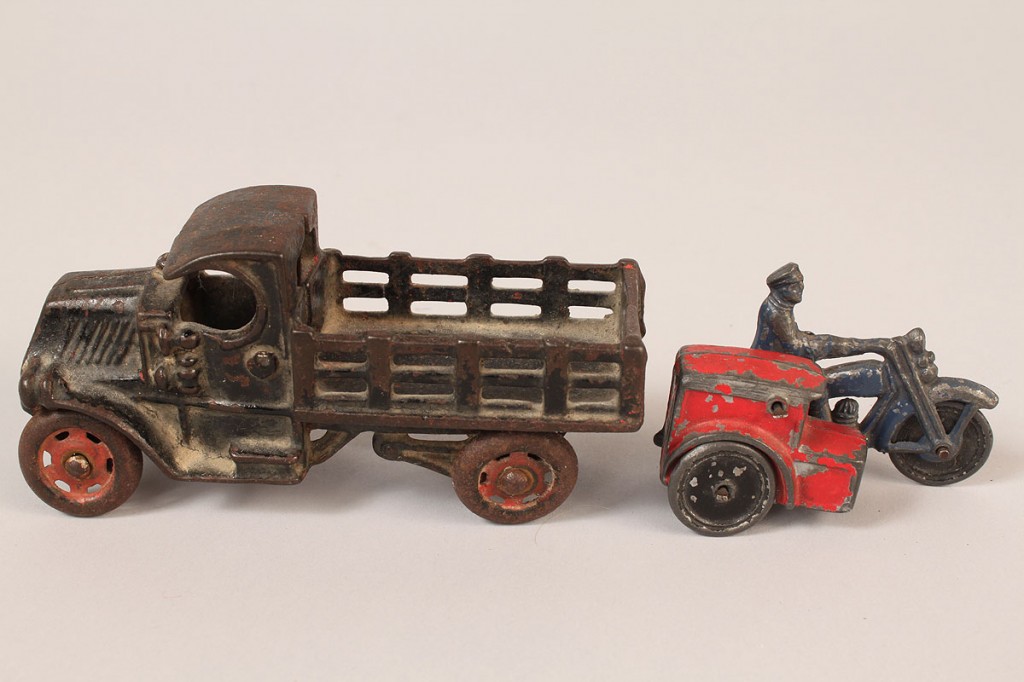 Lot 732: 3 Cast Iron toys w/ Hubley Harley Davidson, truck,