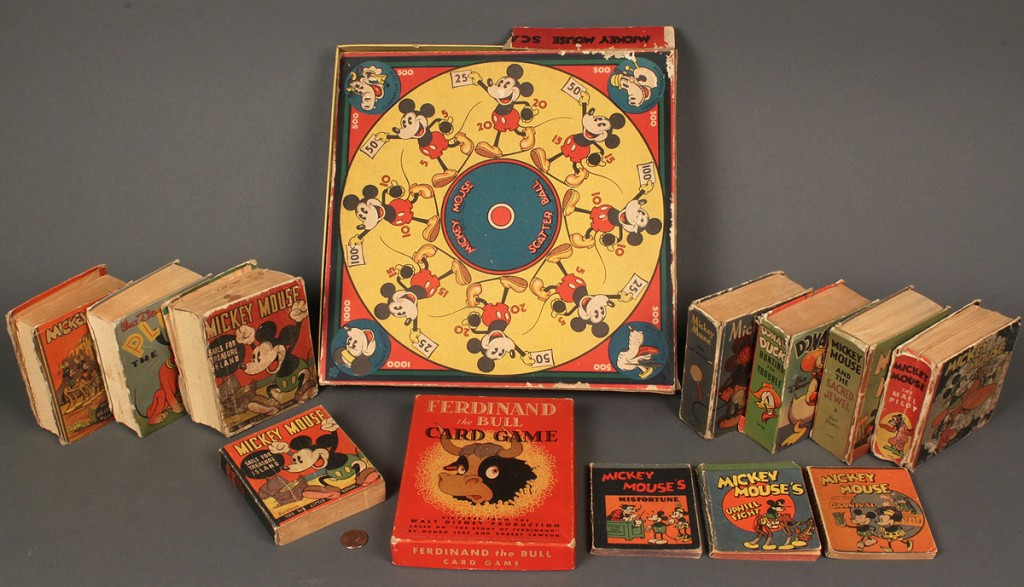 Lot 738: Grouping of Mickey Mouse Related Toys and Books